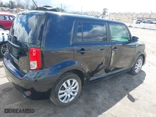 2012 Scion xB with VIN JTLZE4FEXCJ024876, listed as a IAAI auction lot 41798309 with 89,853 mi miles. Bid and sale history available at carsss.com. Image 4.