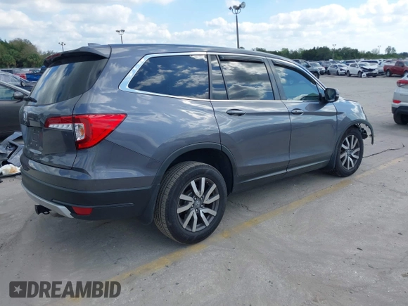 2020 Honda Pilot EX-L with VIN 5FNYF5H59LB014497, listed as a IAAI auction lot 41527415 with 66,625 mi miles. Bid and sale history available at carsss.com. Image 4.
