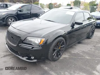 2013 Chrysler 300 SRT-8 with VIN 2C3CCAFJ9DH576184, listed as a IAAI auction lot 42162364 with 104,021 mi miles and . Bid and sale history available at carsss.com. Image 18.