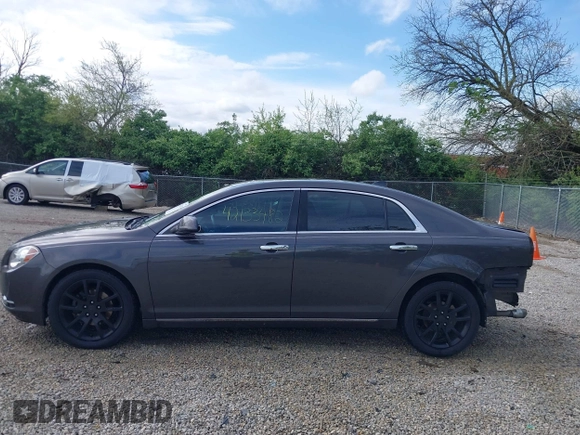 2012 Chevrolet Malibu LTZ with VIN 1G1ZG5E74CF297032, listed as a IAAI auction lot 42133482 with 82,682 mi miles and . Bid and sale history available at DreamBid. Image 15.