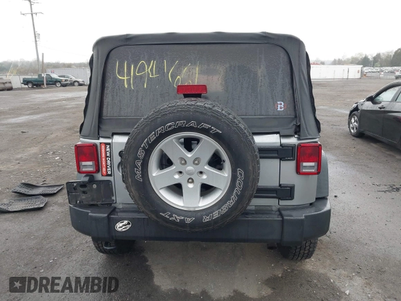 2015 Jeep Wrangler Sport with VIN 1C4AJWAG6FL501160, listed as a IAAI auction lot 41941661 with 134,842 mi miles. Bid and sale history available at carsss.com. Image 16.