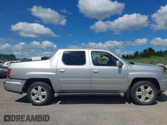 2013 Honda Ridgeline RTL with VIN 5FPYK1F51DB007236, listed as a IAAI auction lot 42762126 with 201,758 mi miles and . Bid and sale history available at DreamBid. Image 13.