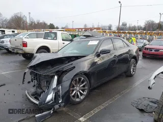2017 Cadillac CTS Luxury AWD with VIN 1G6AX5SS4H0135377, listed as a IAAI auction lot 41442999 with 86,804 mi miles and . Bid and sale history available at DreamBid. Image 2.