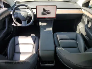 2023 Tesla Model 3 Long Range with VIN 5YJ3E1EB2PF389041, listed as a Copart auction lot 53450725 with 27,060 mi miles and Salvage Title. Bid and sale history available at DreamBid. Image 8.