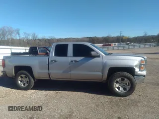 2014 Chevrolet Silverado 1500 LT with VIN 1GCVKREC7EZ120159, listed as a IAAI auction lot 41191282 with 206,836 mi miles and . Bid and sale history available at DreamBid. Image 13.