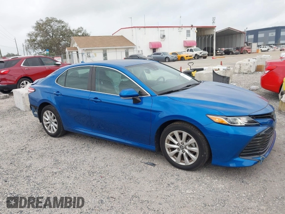 2020 Toyota Camry LE with VIN 4T1L11AK5LU310671, listed as a IAAI auction lot 41732306 with 61,379 mi miles and . Bid and sale history available at carsss.com. Image 14.