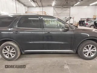 2016 Dodge Durango Limited with VIN 1C4RDJDGXGC331069, listed as a IAAI auction lot 41933888 with 164,147 mi miles and . Bid and sale history available at DreamBid. Image 14.
