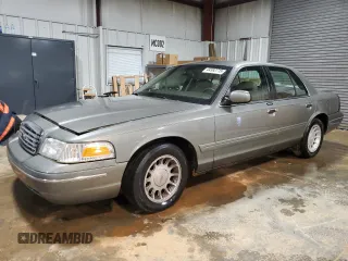 2002 Ford Crown Victoria LX z VIN 2FAFP74W92X150129, wystawiony jako Copart lot #44982715 z przebiegiem 84 346 mil mil oraz Szkody całkowita. Historia ofert i sprzedaży dostępna na DreamBid. Obrazek 1.