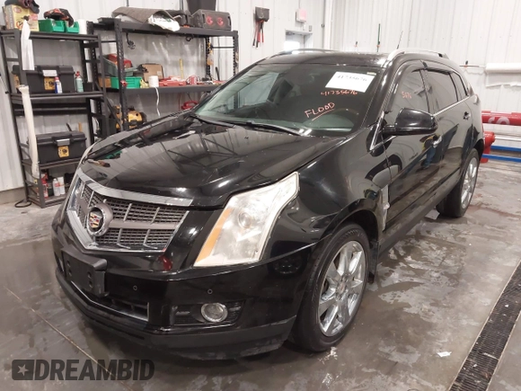 2011 Cadillac SRX Performance Collection with VIN 3GYFNEEY9BS675746, listed as a IAAI auction lot 41735676 with 113,079 mi miles and . Bid and sale history available at carsss.com. Image 6.