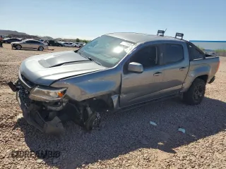 2021 Chevrolet Colorado 4WD ZR2 with VIN 1GCGTEEN1M1114077, listed as a Copart auction lot 61931925 with 74,825 mi miles and Salvage title. Bid and sale history available at DreamBid. Image 1.