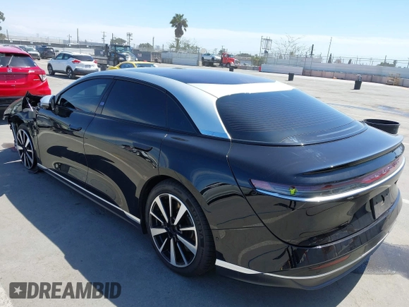 2023 Lucid Air Grand Touring z VIN 50EA1GBA0PA004565, wystawiony jako IAAI lot #41913843 z przebiegiem 25 468 mil mil oraz . Historia ofert i sprzedaży dostępna na DreamBid. Obrazek 3.