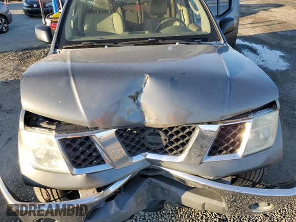 2007 Nissan Frontier SE z VIN 1N6AD09U47C427847, wystawiony jako Copart lot #45596155 z przebiegiem 170 980 mil mil oraz Szkoda całkowita • Salvage title. Historia ofert i sprzedaży dostępna na DreamBid. Obrazek 11.