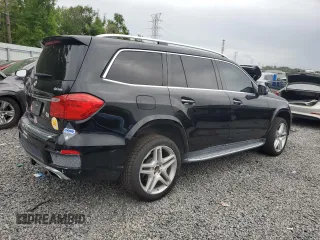 2016 Mercedes-Benz GL with VIN 4JGDF7DE9GA683041, listed as a Copart auction lot 51802315 with 128,755 mi miles and Salvage Title. Bid and sale history available at carsss.com. Image 3.