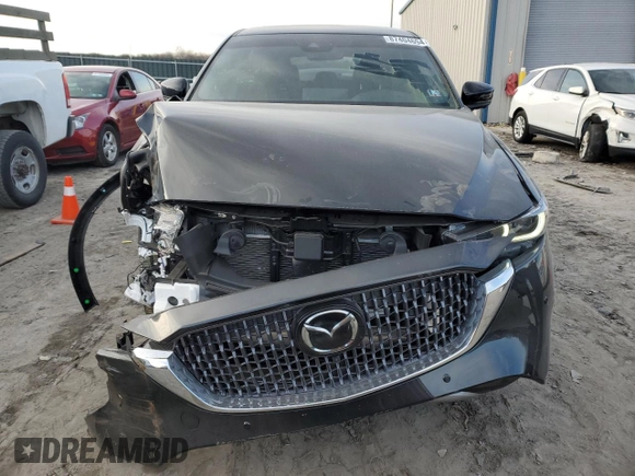 2024 Mazda CX-5 2.5 Turbo Signature with VIN JM3KFBXY7R0515256, listed as a Copart auction lot 87404694 with 4,699 mi miles and Salvage Title. Bid and sale history available at carsss.com. Image 5.