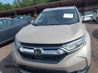 2018 Honda CR-V Touring with VIN 5J6RW2H96JL000910, listed as a IAAI auction lot 42490580 with 201,534 mi miles and . Bid and sale history available at DreamBid. Image 6.