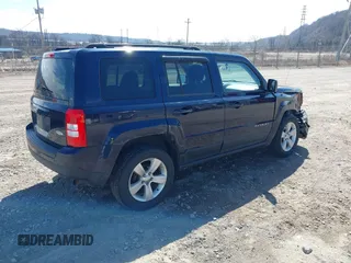 2014 Jeep Patriot Latitude with VIN 1C4NJRFB0ED760607, listed as a IAAI auction lot 41846134 with 136,041 mi miles. Bid and sale history available at carsss.com. Image 4.