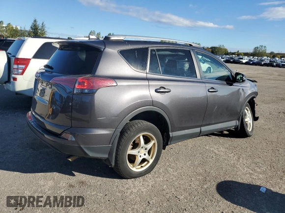 2016 Toyota RAV4 LE with VIN 2T3ZFREV3GW269727, listed as a Copart auction lot 74796814 with 235,242 mi miles and Salvage Title. Bid and sale history available at DreamBid. Image 3.