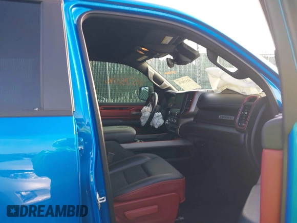 2022 Ram 1500 Rebel z VIN 1C6SRFLT0NN177124, wystawiony jako IAAI lot #41575076 z przebiegiem 40 065 mil mil oraz . Historia ofert i sprzedaży dostępna na DreamBid. Obrazek 5.