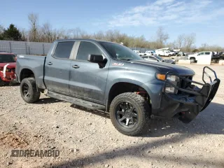 2021 Chevrolet Silverado 1500 Custom Trail Boss with VIN 1GCPYCEF9MZ145030, listed as a Copart auction lot 49267015 with 111,544 mi miles and Salvage Title. Bid and sale history available at DreamBid. Image 4.
