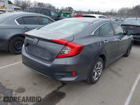 2017 Honda Civic LX with VIN 19XFC2F52HE233607, listed as a IAAI auction lot 41758632 with 159,290 mi miles and . Bid and sale history available at DreamBid. Image 4.