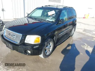 2005 GMC Envoy SLE z VIN 1GKDT13S952288760, wystawiony jako IAAI lot #41671656 z przebiegiem Nie podano mil oraz . Historia ofert i sprzedaży dostępna na DreamBid. Obrazek 2.