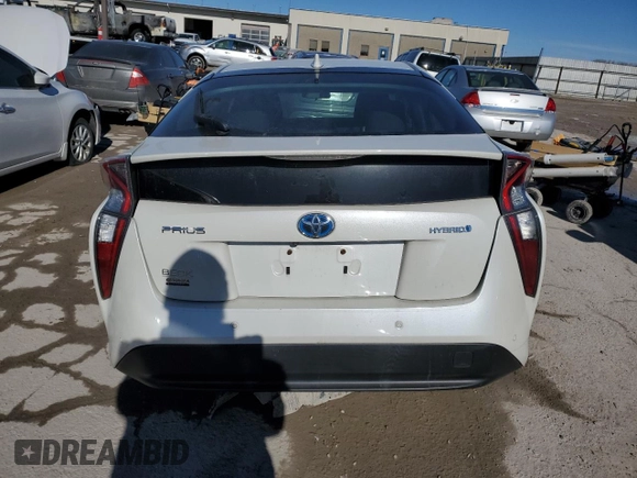 2017 Toyota Prius Two with VIN JTDKARFUXH3041993, listed as a Copart auction lot 42893865 with 96,887 mi miles and Clean Title. Bid and sale history available at DreamBid. Image 6.