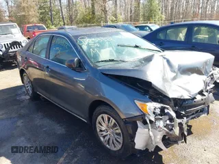 2012 Toyota Camry L z VIN 4T1BF1FK3CU102200, wystawiony jako IAAI lot #41833822 z przebiegiem 241 255 mil mil oraz . Historia ofert i sprzedaży dostępna na DreamBid. Obrazek 1.