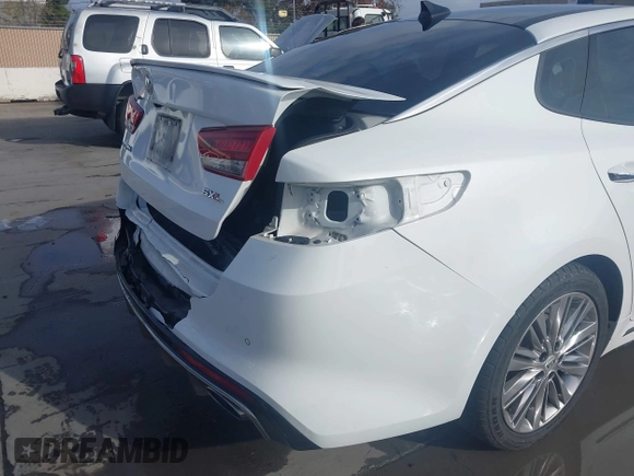 2016 Kia Optima SXL Turbo with VIN 5XXGV4L20GG074869, listed as a IAAI auction lot 41212808 with 82,884 mi miles. Bid and sale history available at carsss.com. Image 18.