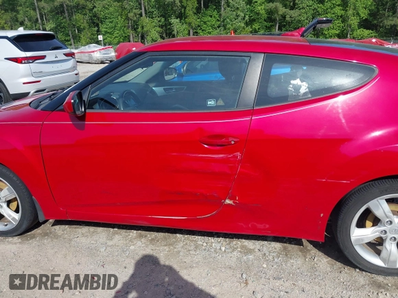 2013 Hyundai Veloster w/Gray Int with VIN KMHTC6AD8DU112810, listed as a IAAI auction lot 42144625 with 142,524 mi miles and . Bid and sale history available at DreamBid. Image 14.