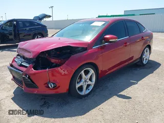 2013 Ford Focus Titanium with VIN 1FADP3J23DL334161, listed as a IAAI auction lot 41987758 with 117,665 mi miles and . Bid and sale history available at carsss.com. Image 2.