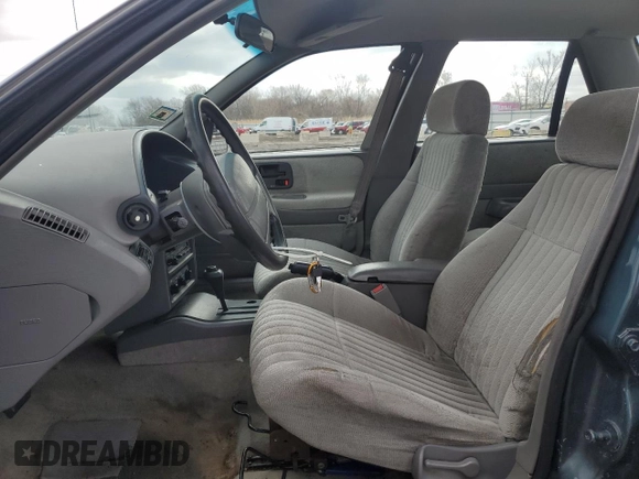 1995 Chevrolet Corsica with VIN 1G1LD55MXSY262499, listed as a Copart auction lot 49484825 with 124,419 mi miles and Salvage Title. Bid and sale history available at DreamBid. Image 7.