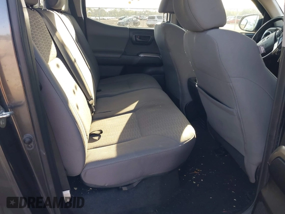 2018 Toyota Tacoma SR5 with VIN 3TMAZ5CN4JM069965, listed as a IAAI auction lot 41798238 with 124,619 mi miles and . Bid and sale history available at DreamBid. Image 8.