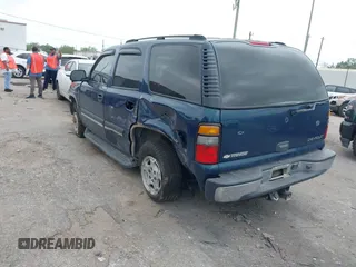 2005 Chevrolet Tahoe LS with VIN 1GNEC13V35R202755, listed as a IAAI auction lot 41951169 with 88,330 mi miles and . Bid and sale history available at DreamBid. Image 3.