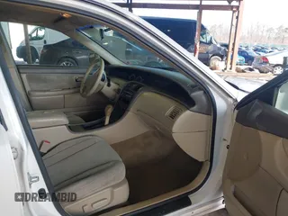 2001 Toyota Avalon XL z VIN 4T1BF28B01U144968, wystawiony jako IAAI lot #41923697 z przebiegiem 184 442 mil mil oraz . Historia ofert i sprzedaży dostępna na DreamBid. Obrazek 5.