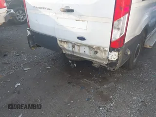 2016 Ford Transit XL z VIN 1FDZX2CM0GKB22459, wystawiony jako IAAI lot #40693295 z przebiegiem 302 216 mil mil oraz . Historia ofert i sprzedaży dostępna na DreamBid. Obrazek 17.