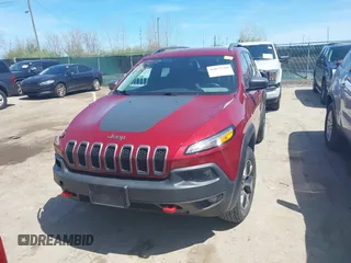 2016 Jeep Cherokee Trailhawk with VIN 1C4PJMBS9GW237059, listed as a IAAI auction lot 42079788 with 114,513 mi miles. Bid and sale history available at carsss.com. Image 13.