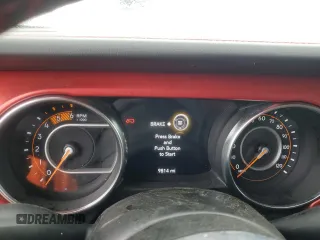 2023 Jeep Wrangler Rubicon with VIN 1C4JJXFM4PW589923, listed as a Copart auction lot 58725465 with 9,814 mi miles and Salvage title. Bid and sale history available at DreamBid. Image 9.