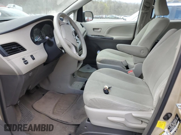 2012 Toyota Sienna with VIN 5TDZK3DC1CS260416, listed as a Copart auction lot 52860155 with 140,714 mi miles and Salvage Title. Bid and sale history available at carsss.com. Image 7.