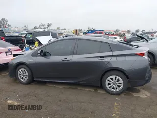 2018 Toyota Prius Two with VIN JTDKBRFUXJ3591956, listed as a IAAI auction lot 41848336 with 62,560 mi miles and . Bid and sale history available at DreamBid. Image 14.