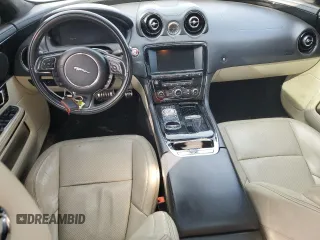 2015 Jaguar XJ with VIN SAJWA1CZ9F8V88418, listed as a Copart auction lot 45547965 with 82,423 mi miles and Salvage Title. Bid and sale history available at carsss.com. Image 8.