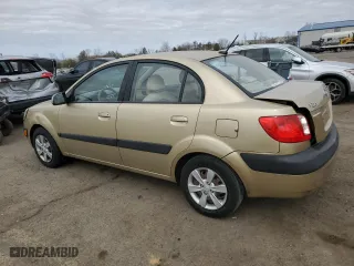 2009 Kia Rio SX with VIN KNADE223996539049, listed as a Copart auction lot 49114175 with 128,072 mi miles and Salvage Title. Bid and sale history available at carsss.com. Image 2.