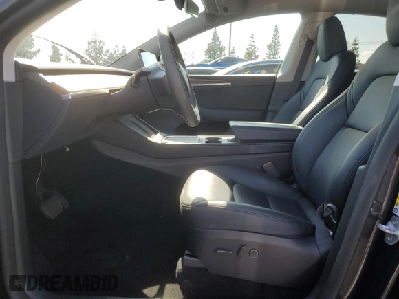 2024 Tesla Model Y with VIN 7SAYGDED7RF056973, listed as a Copart auction lot 55310705 with 15,391 mi miles and Salvage Title. Bid and sale history available at DreamBid. Image 7.