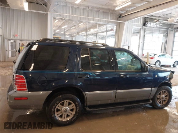 2003 Mercury Mountaineer Convenience z VIN 4M2ZU86W03UJ16828, wystawiony jako IAAI lot #41580919 z przebiegiem 148 968 mil mil oraz . Historia ofert i sprzedaży dostępna na DreamBid. Obrazek 13.