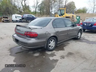 1999 Oldsmobile Cutlass GLS z VIN 1G3NG52J1X6338096, wystawiony jako IAAI lot #42001327 z przebiegiem 77 452 mil mil oraz . Historia ofert i sprzedaży dostępna na DreamBid. Obrazek 4.