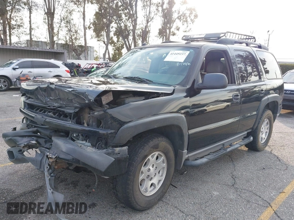 2004 Chevrolet Tahoe LS with VIN 1GNEK13T64R265302, listed as a IAAI auction lot 41445237 with 242,840 mi miles. Bid and sale history available at carsss.com. Image 2.