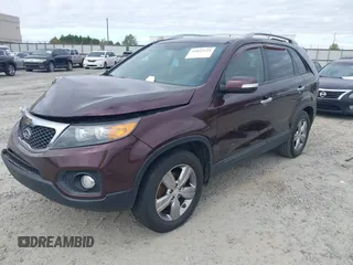 2013 Kia Sorento EX with VIN 5XYKU4A21DG312753, listed as a IAAI auction lot 41033124 with 197,459 mi miles and . Bid and sale history available at carsss.com. Image 2.