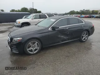 2018 Mercedes-Benz E 300 with VIN WDDZF4KB2JA389902, listed as a Copart auction lot 59541855 with 51,708 mi miles and Salvage title. Bid and sale history available at DreamBid. Image 1.
