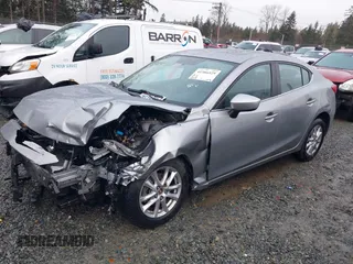 2014 Mazda 3 i Grand Touring with VIN JM1BM1W73E1214537, listed as a IAAI auction lot 41586529 with Not Provided miles and . Bid and sale history available at carsss.com. Image 2.