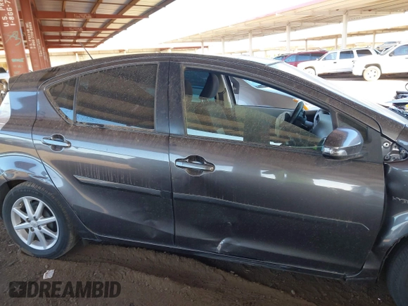 2014 Toyota Prius One with VIN JTDKDTB38E1572456, listed as a IAAI auction lot 41975766 with 88,075 mi miles and . Bid and sale history available at DreamBid. Image 12.
