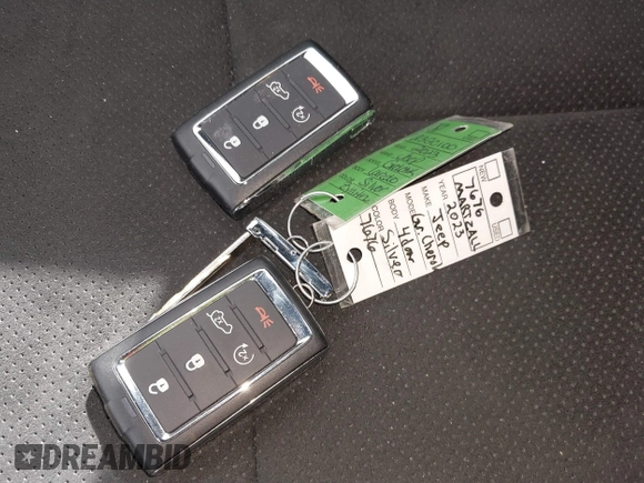 2023 Jeep Grand Cherokee Laredo with VIN 1C4RJHAG2PC660418, listed as a IAAI auction lot 41693879 with 4,295 mi miles and . Bid and sale history available at DreamBid. Image 11.